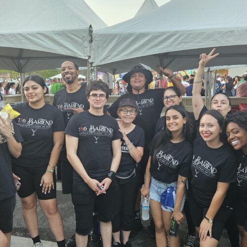 786-Bartend students posing at Calle Ocho 2025 festival in Little Havana after working event beer tents