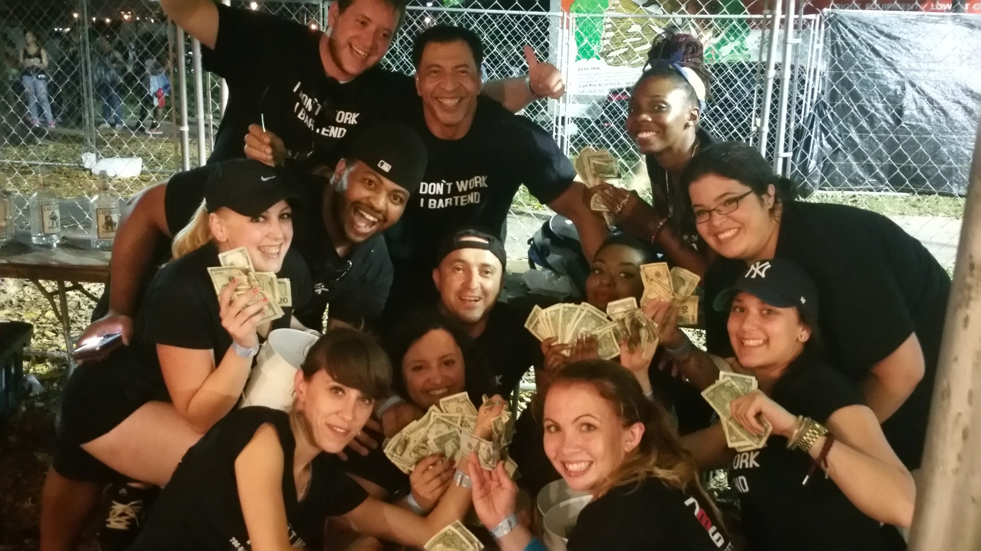 786-Bartend students counting their tips after bartending an event